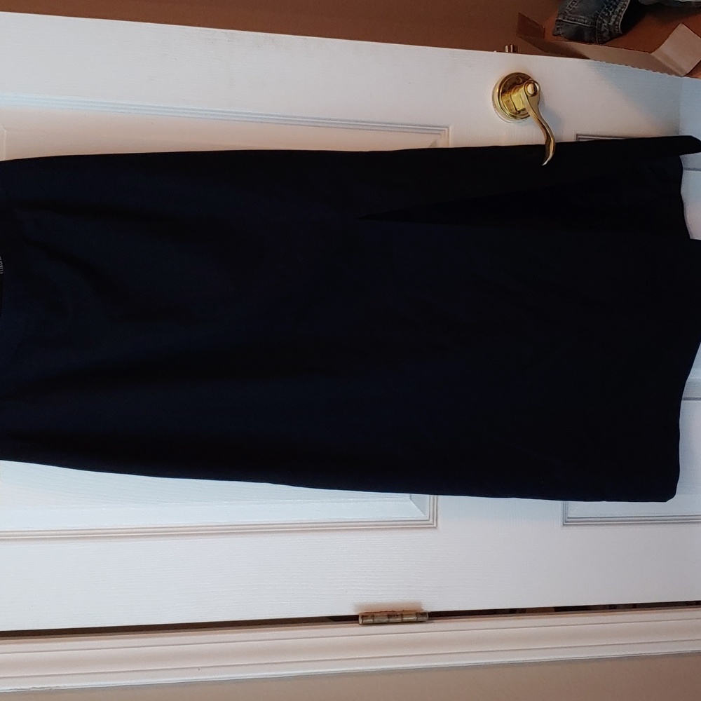Long black pencil skirt with front slit. Size 12.